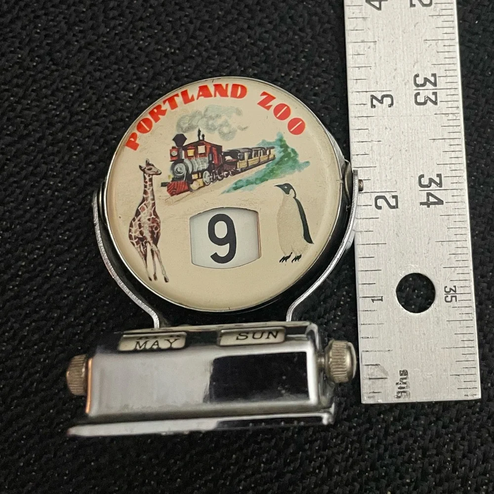 VTG metal perpetual flip calendar featuring Portland Zoo graphic